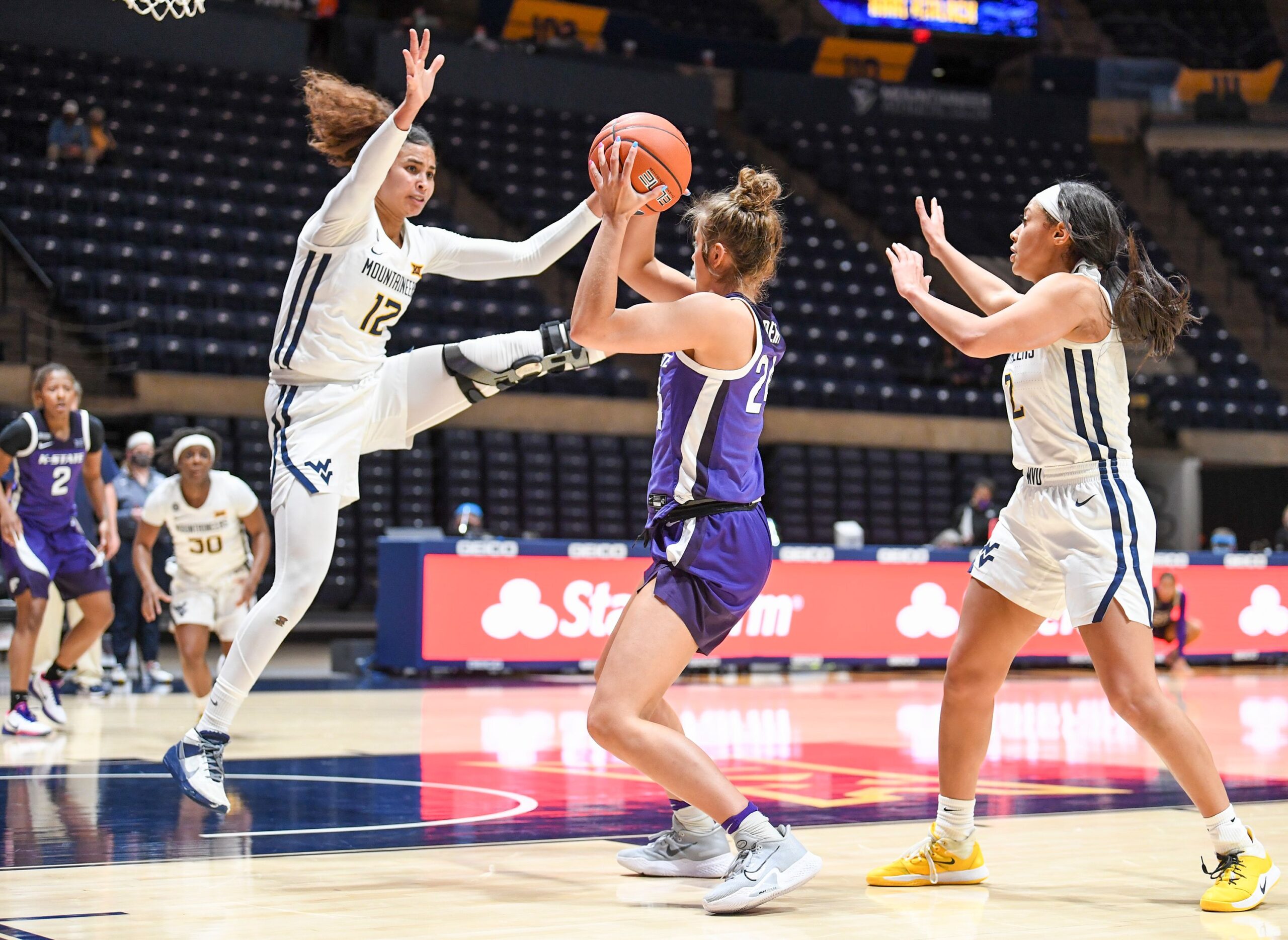 Mountaineers end game on 21-0 run to down Kansas State 65-56